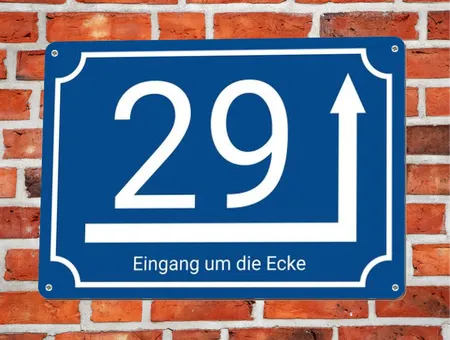 Wegweiser Eingang um die Ecke Bild