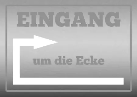  Wegweiser Eingang um die Ecke Bild