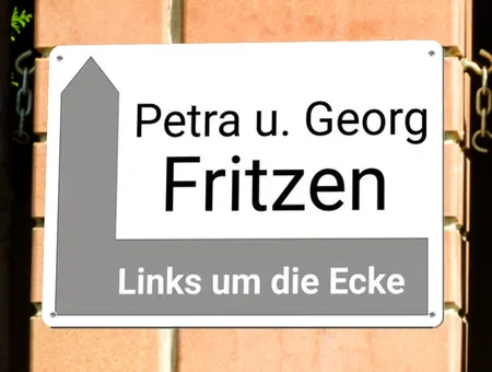 Wegweiser Links um die Ecke Bild