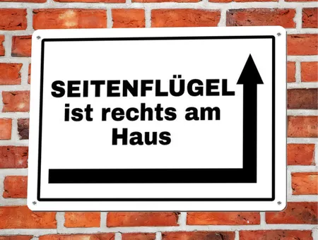 Wegweiser SEITENFLÜGEL rechts am Haus Bild