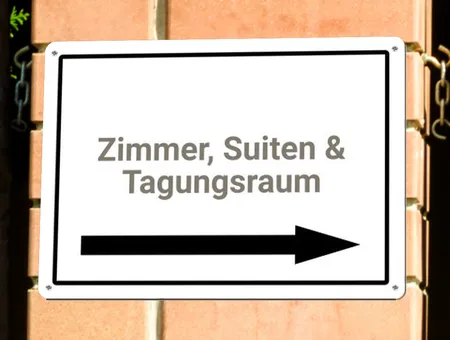  Wegweiser Zimmer, Suiten, Tagungsraum Bild